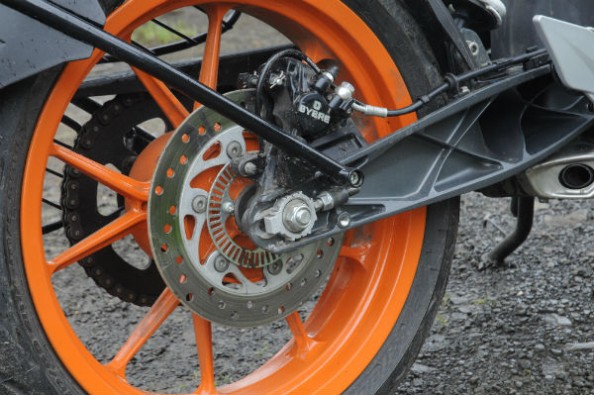At the rear, the bike uses a	single piston, 230mm disc (ABS)