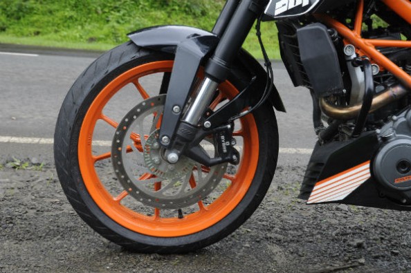 Up front, the bike gets four piston, radial mounted caliper, 300mm disc (with ABS)