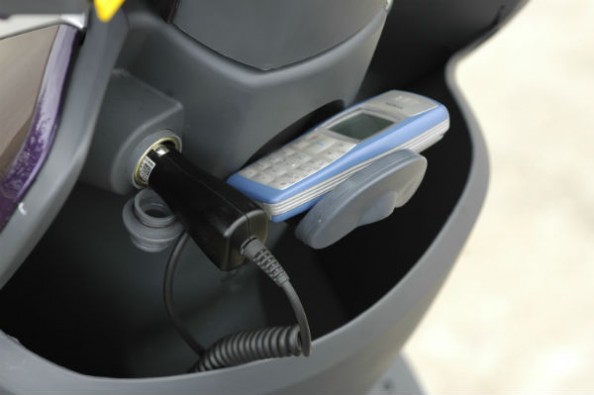 Mobile charger under handlebars.