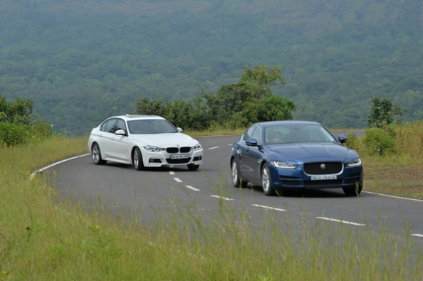 BMW 330i vs Jaguar XE 25t in action.