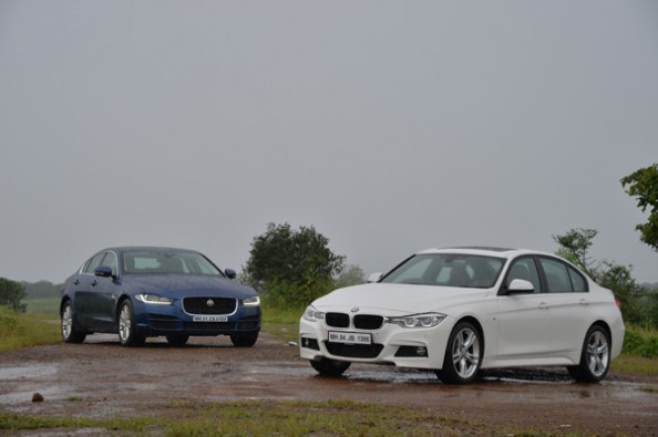 BMW 330i vs Jaguar XE 25t front.
