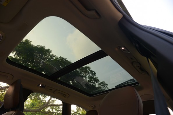 Huge sunroof opens up the car.