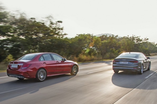 The rear on the Audi looks nicer.