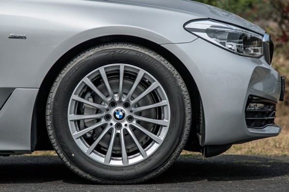 Multi-spoke alloy wheels look small.