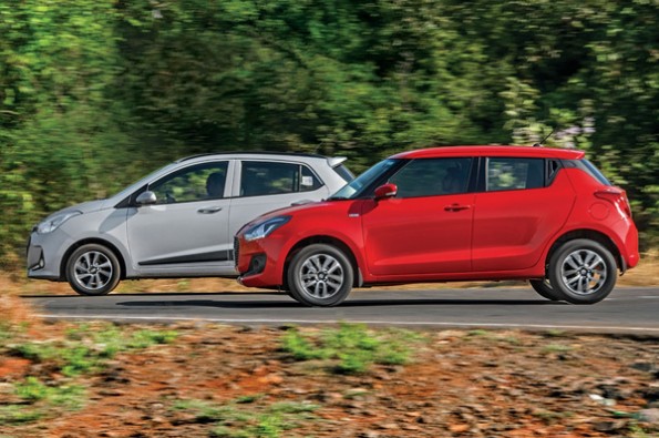 The all-new Swift takes on its biggest rival.