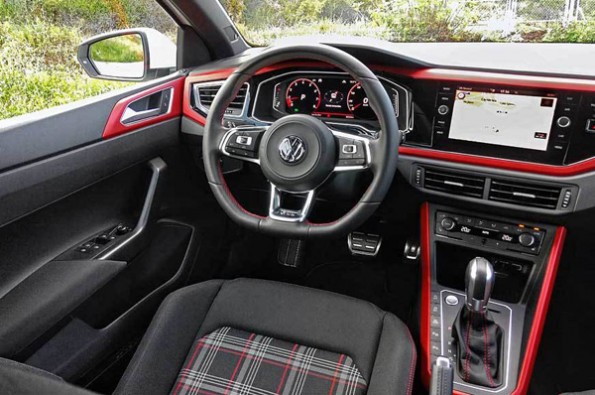 The use of red on the inside makes the car look sporty.