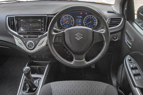 The all-black interior in the Baleno looks sporty.