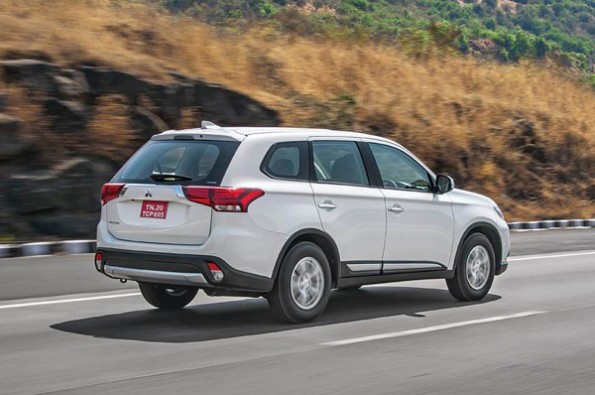 The rear features swept around tailights.