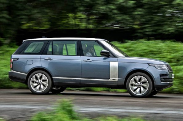 The car has a long wheelbase and large 21-inch wheels