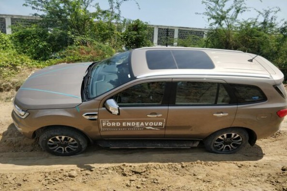 Steel Grey Ford Endeavour Side Profile