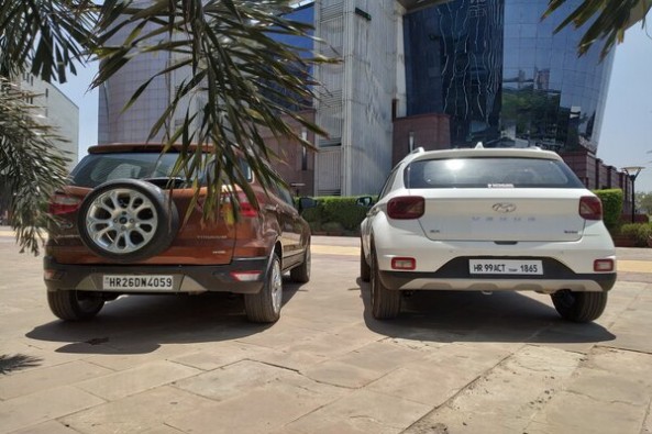 White Color Hyundai Venue and Copper Color Ford EcoSport Rear Profiles