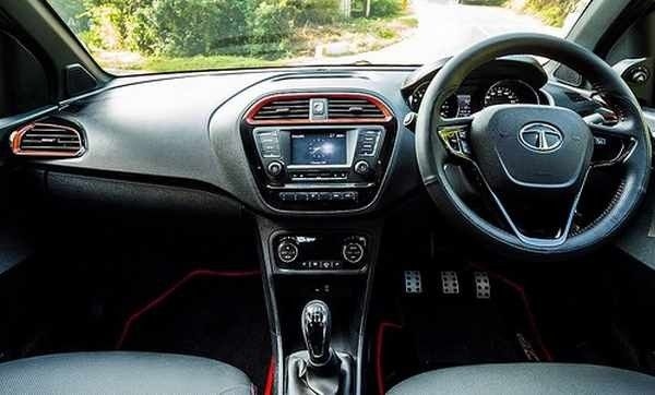 The all-black cabin theme works well, red accents add a sporty touch
