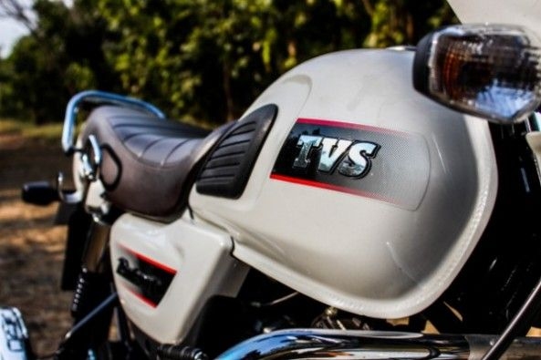 The TVS Radeon gets a USB charging port next to the headlight