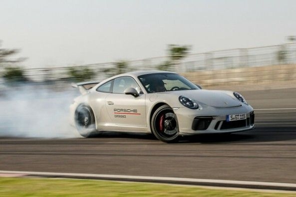 White Color Porsche 911 on Track