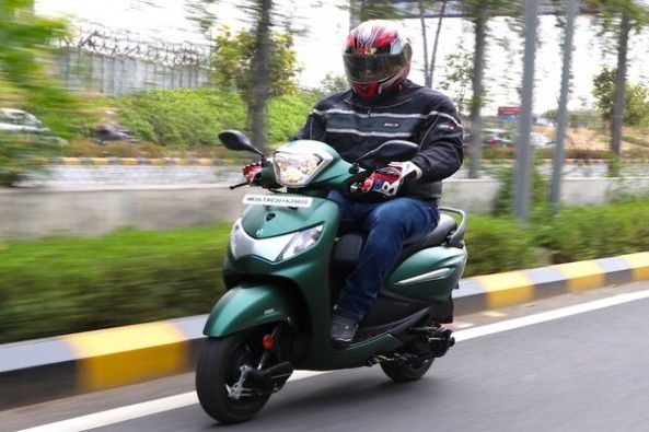 Green Color Hero Pleasure Plus Front Profile With Rider